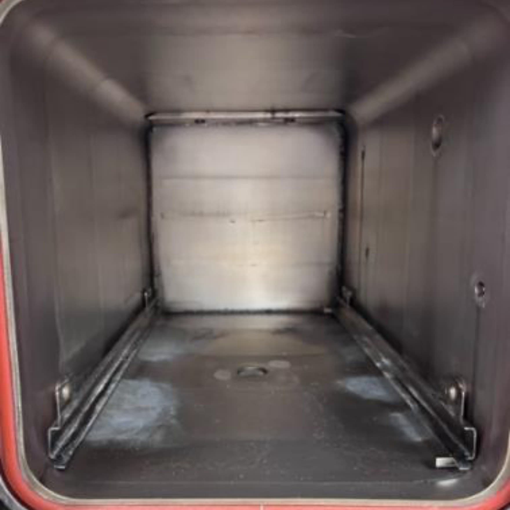 A sterilizer chamber with heavy staining before a Maximo Medical cleaning
