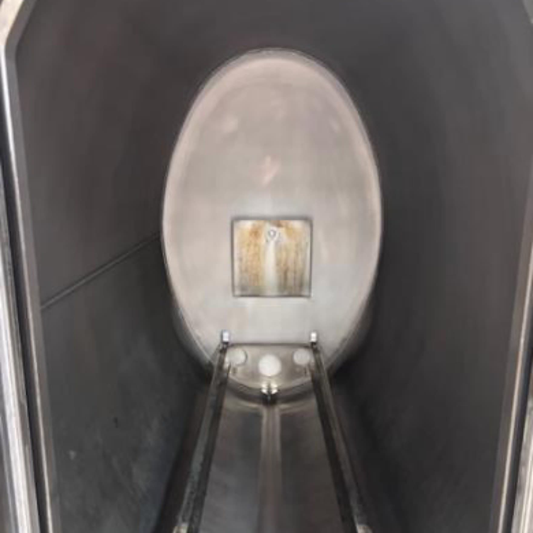 A stained sterilizer chamber interior before a Maximo Medical cleaning