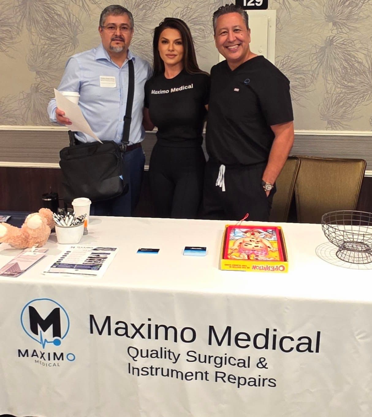 The Maximo Medical team behind its branded booth at a sterile processing conference