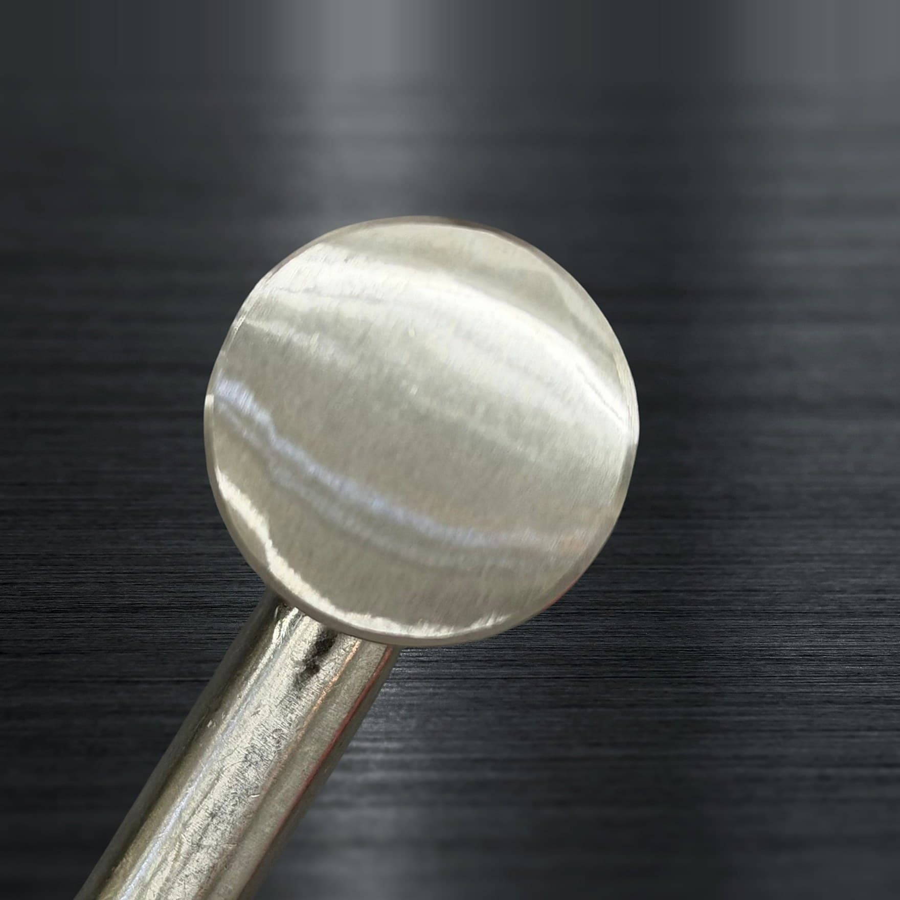 The same surgical instrument after service, cleaned and polished